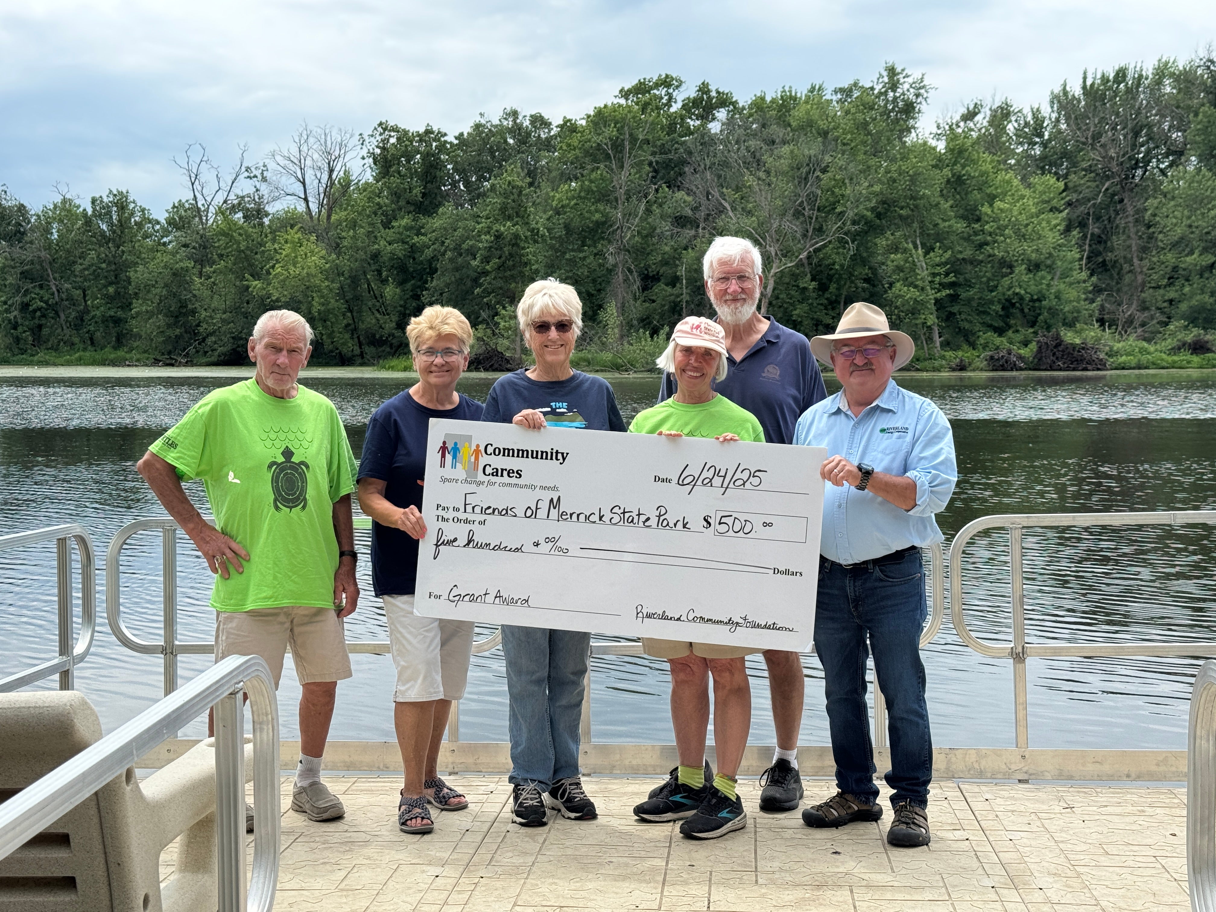 Friends of Merrick Park Check Presentation - On the dock